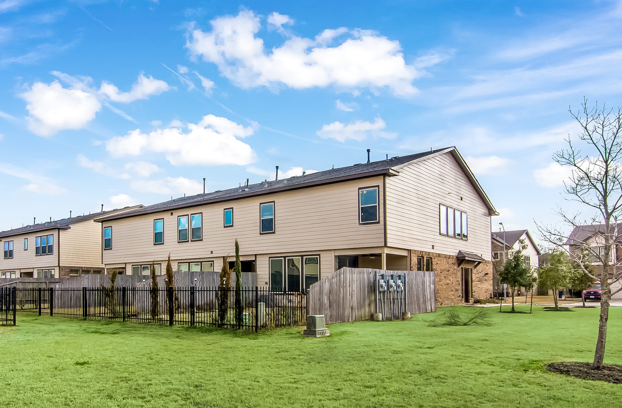 3311 Rainflower Springs Lane Rosenberg, TX 77471 - Photo 33 of 35 a view of a house with a yard
