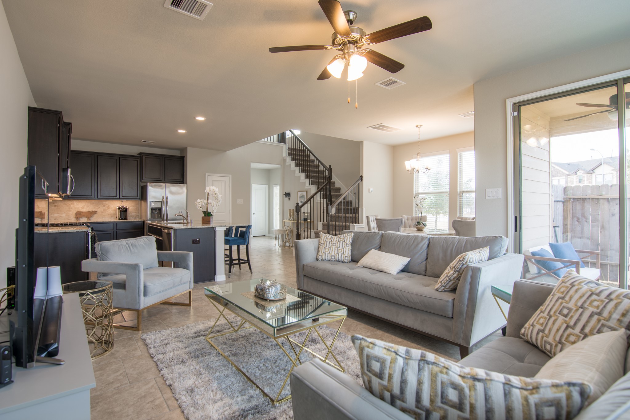 3311 Rainflower Springs Lane Rosenberg, TX 77471 - Photo 4 of 35 a living room with furniture kitchen view and a large window