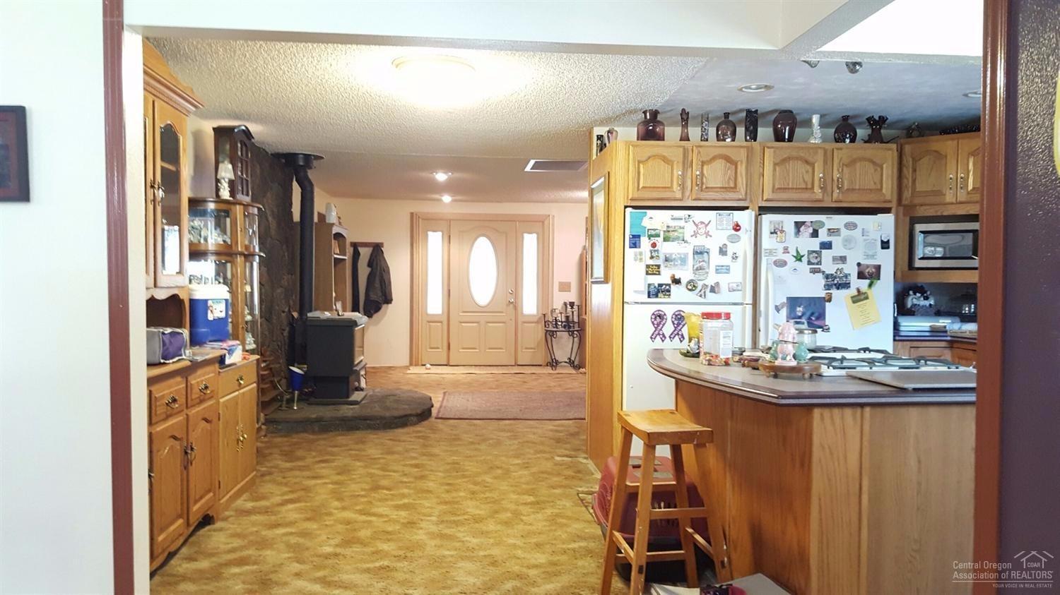 17255 Covina Road Bend, OR 97707 - Photo 11 of 19 View from dining toward front door... 2