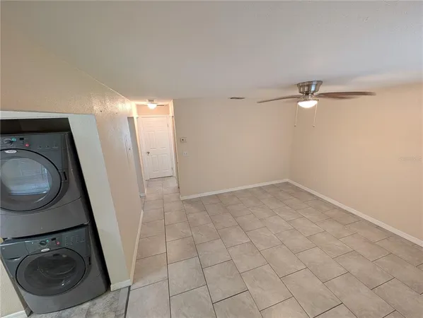 a bathroom with a glass door shower and a sink