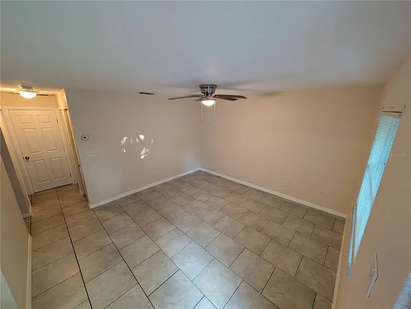 a bathroom with a sink a toilet a mirror and shower