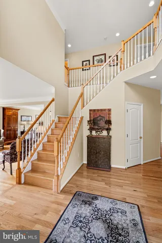 a living room with furniture rug and window