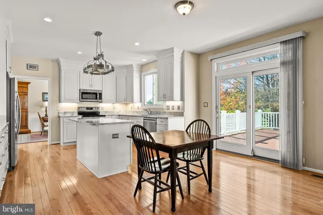 a view of workspace with furniture and window