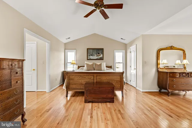 a view of a porch with wooden walls