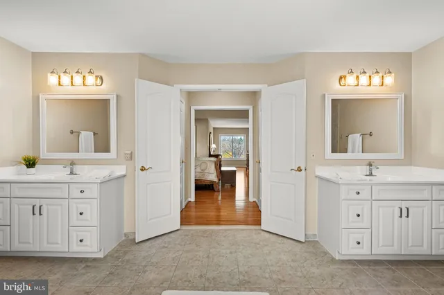 an aerial view of a house with a ocean view