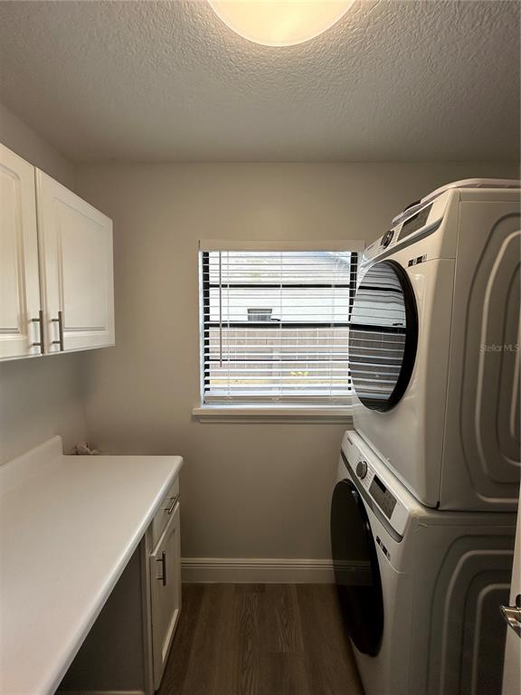 3926 Greenview Pines Court Orlando, FL 32817 - Photo 11 of 28 a utility room with dryer and washer