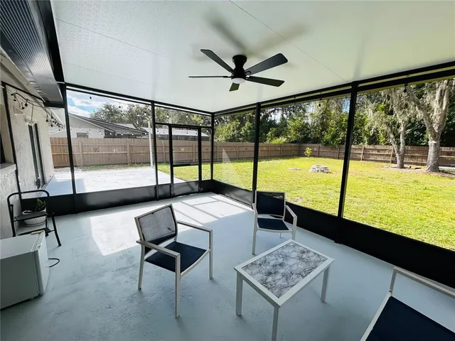a living room with couch and a table