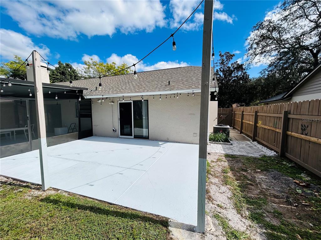 3926 Greenview Pines Court Orlando, FL 32817 - Photo 25 of 28 a view of a terrace with a bench