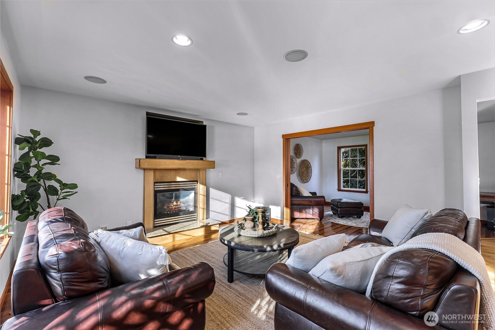 3395 Mack Road Everson, WA 98247 - Photo 17 of 39 a living room with furniture and a fireplace