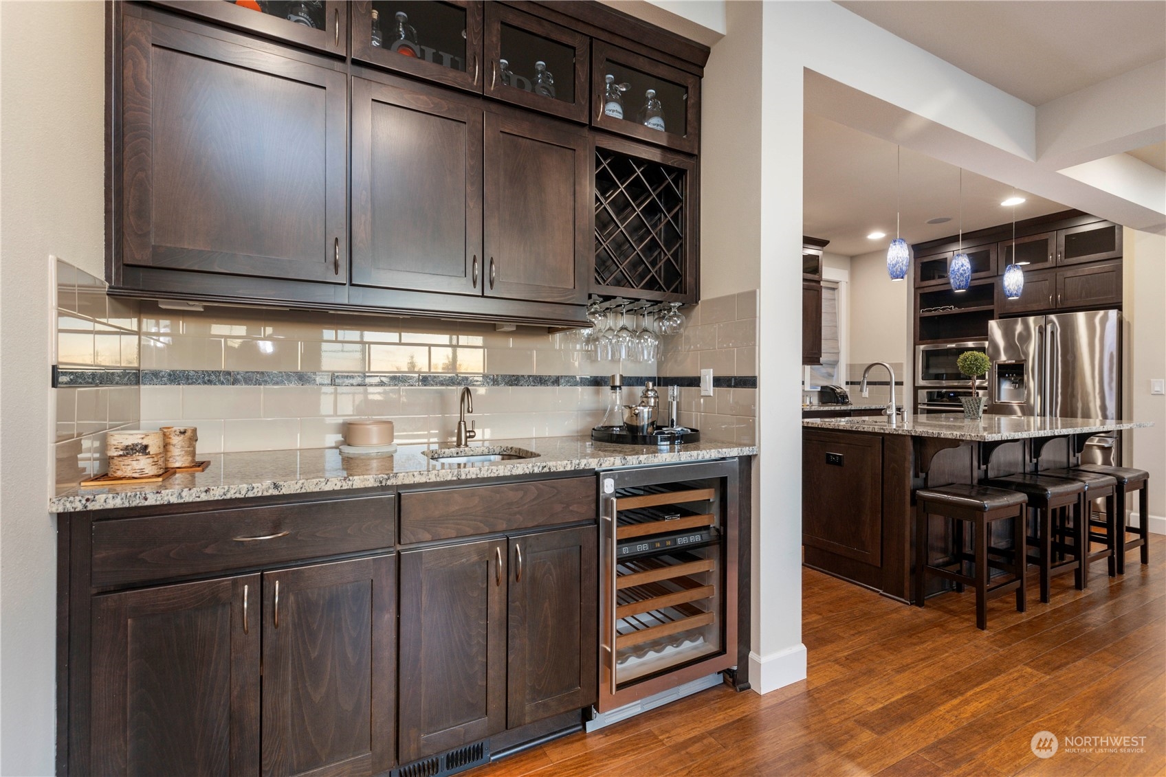 3318 Lake Washington Boulevard North Renton, WA 98056 - Photo 14 of 40 a kitchen with stainless steel appliances a sink and cabinets