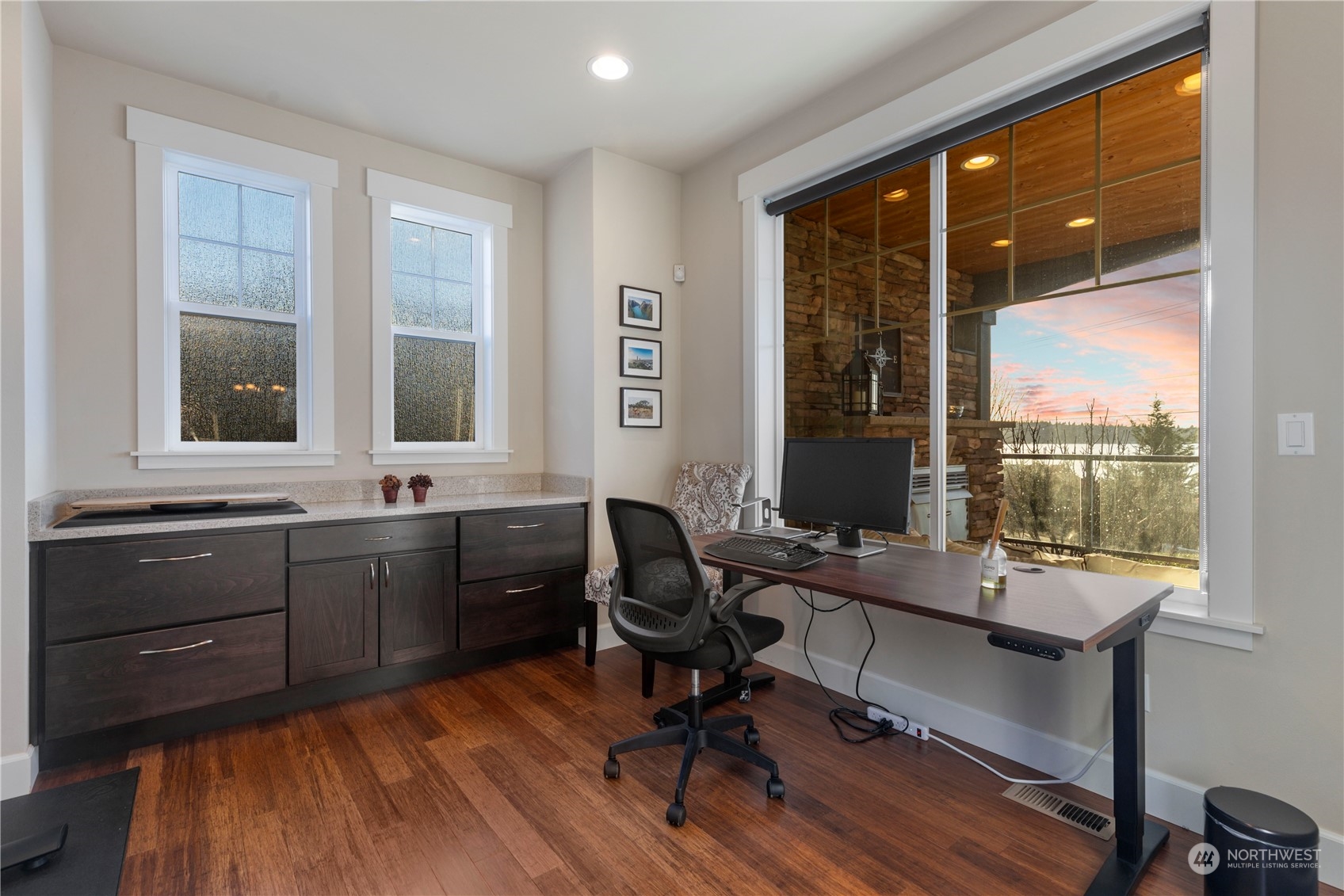 3318 Lake Washington Boulevard North Renton, WA 98056 - Photo 18 of 40 a room with a large window and a wooden table