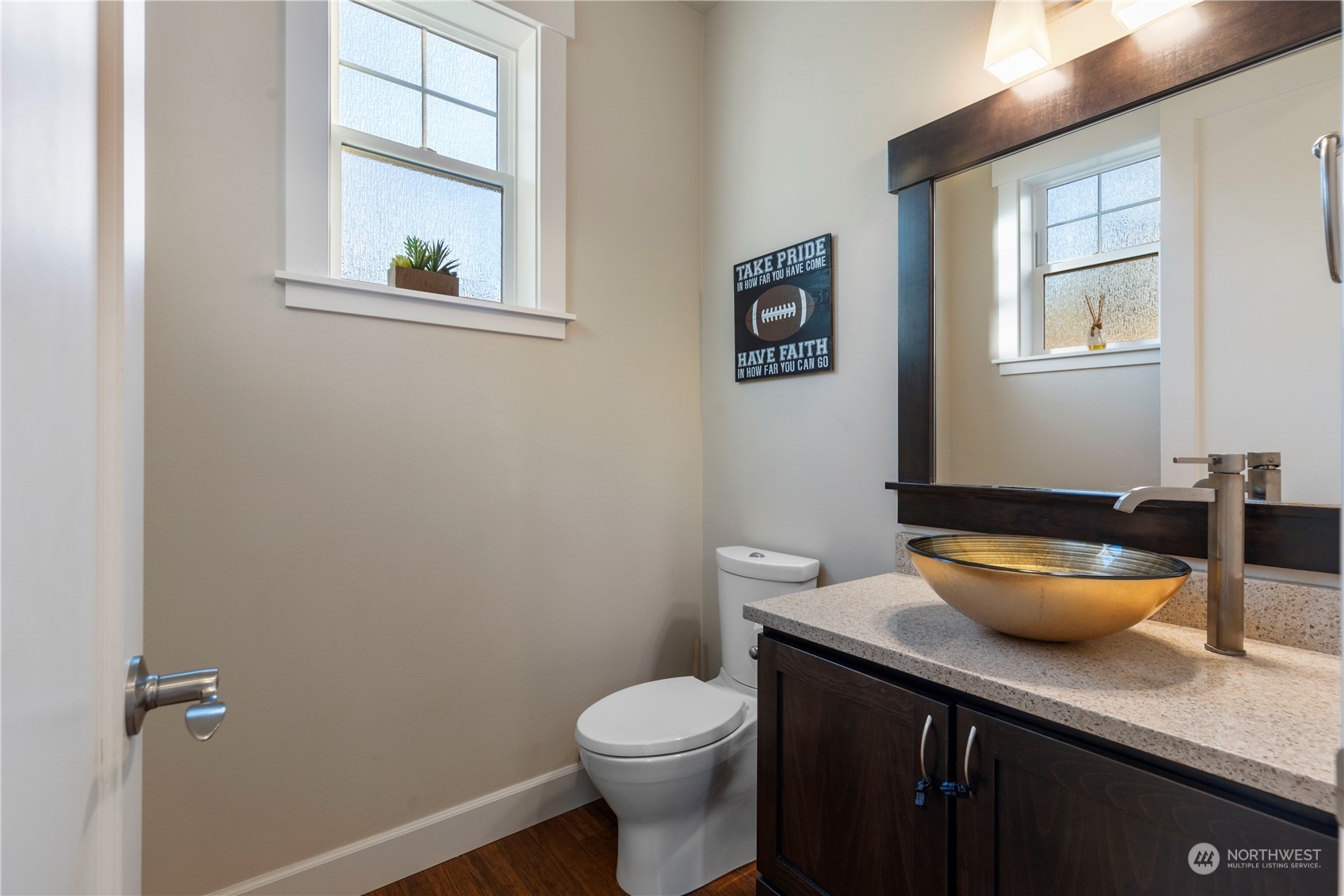 3318 Lake Washington Boulevard North Renton, WA 98056 - Photo 20 of 40 a bathroom with a granite countertop toilet and a sink