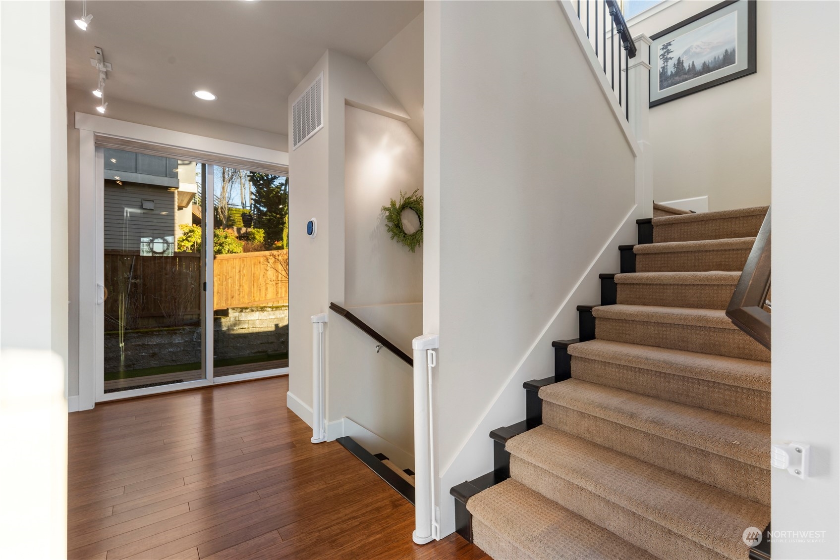 3318 Lake Washington Boulevard North Renton, WA 98056 - Photo 21 of 40 a view of entryway and hall with wooden floor