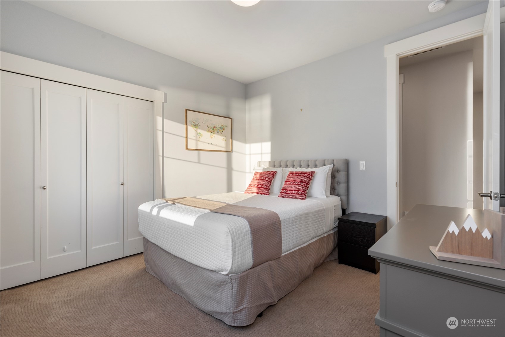 3318 Lake Washington Boulevard North Renton, WA 98056 - Photo 26 of 40 a bedroom with a bed and a window