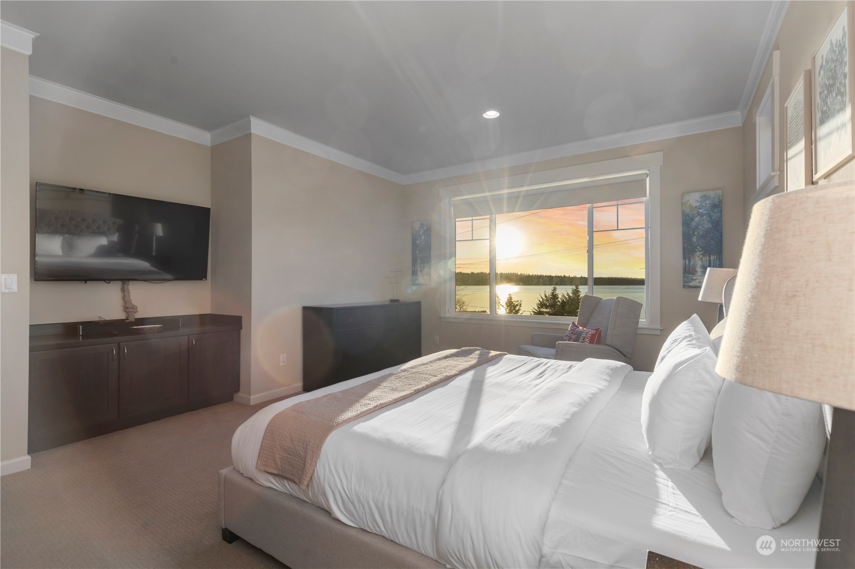 3318 Lake Washington Boulevard North Renton, WA 98056 - Photo 29 of 40 a bedroom with a bed and a television in it