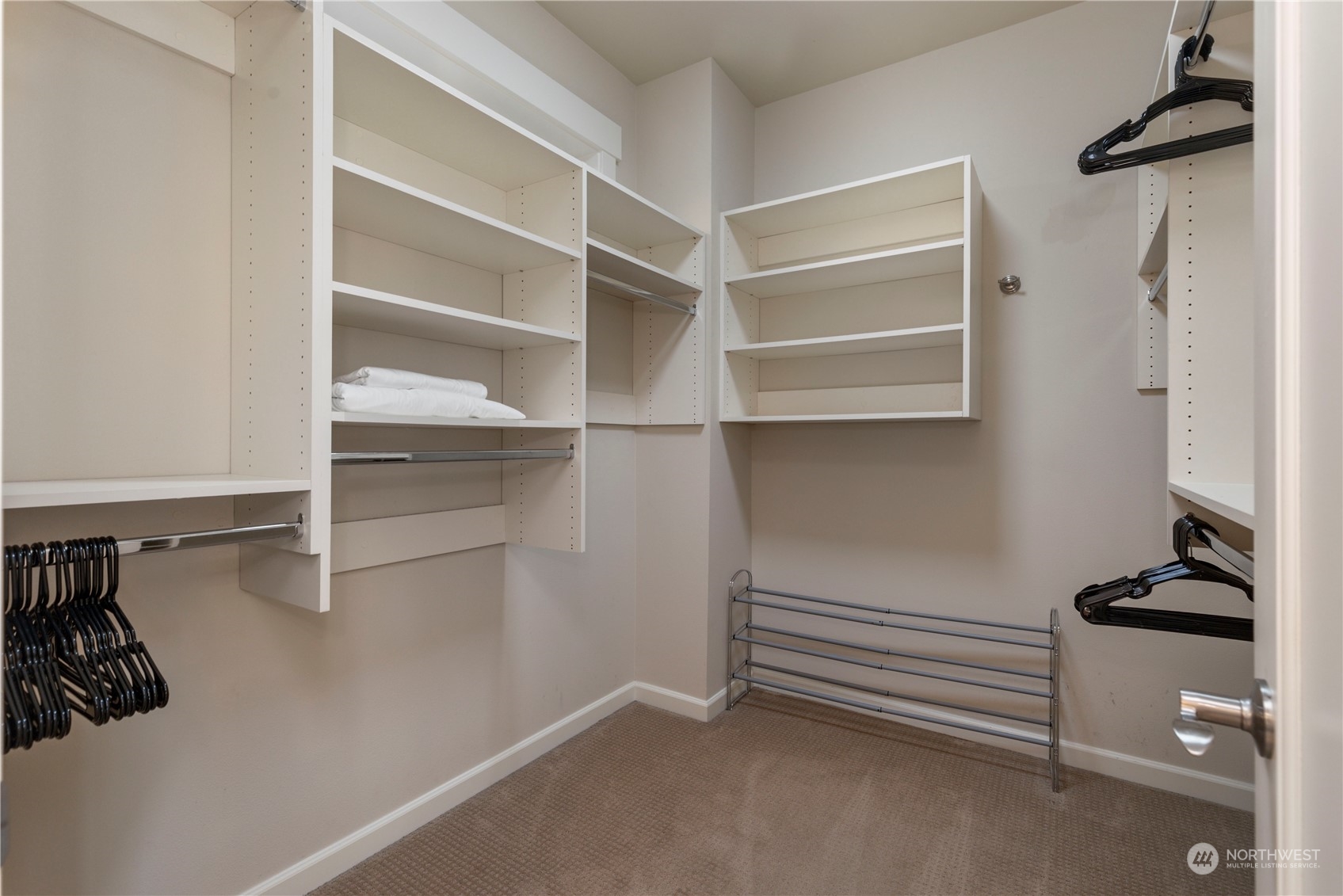 3318 Lake Washington Boulevard North Renton, WA 98056 - Photo 30 of 40 a view of walk in closet with empty racks