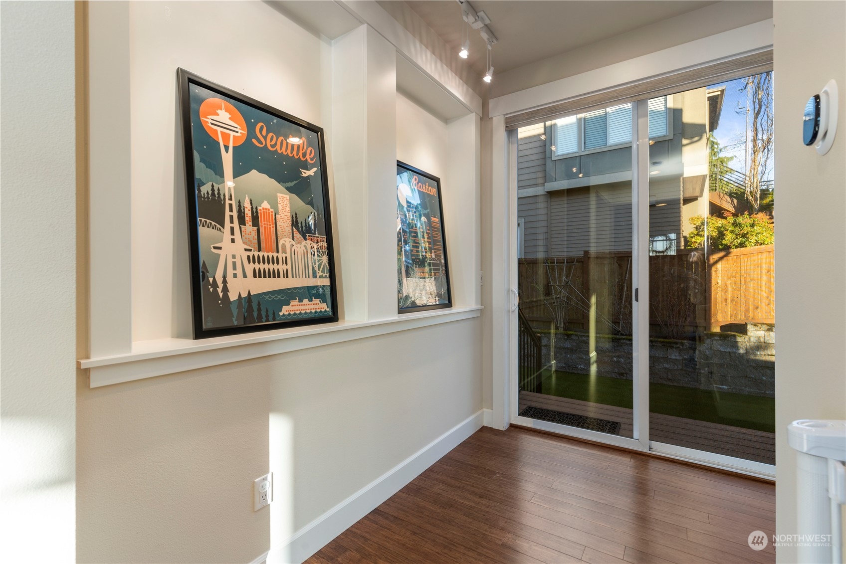 3318 Lake Washington Boulevard North Renton, WA 98056 - Photo 37 of 40 a view of a hallway with wooden floor and windows