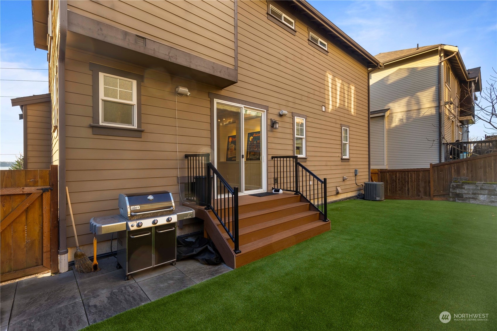3318 Lake Washington Boulevard North Renton, WA 98056 - Photo 39 of 40 a view of a house with a yard and sitting area