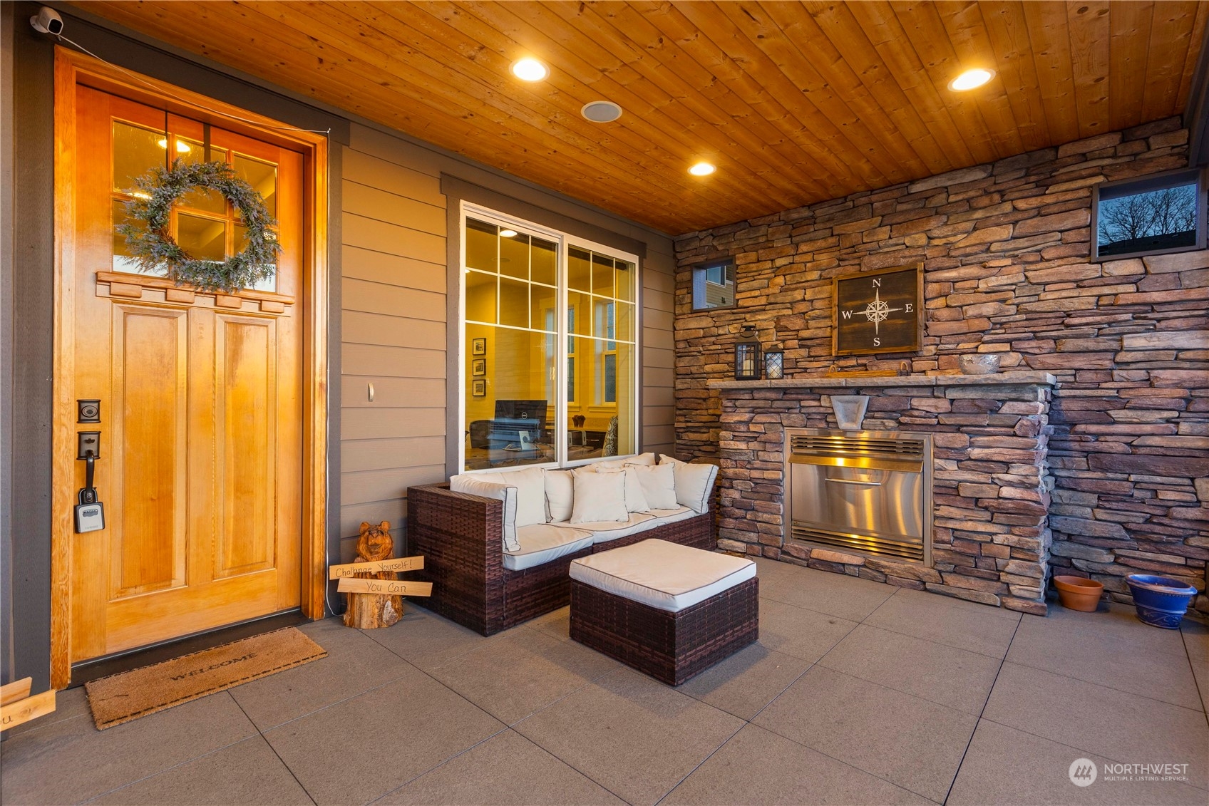 3318 Lake Washington Boulevard North Renton, WA 98056 - Photo 4 of 40 a outdoor living space with patio furniture and a fireplace