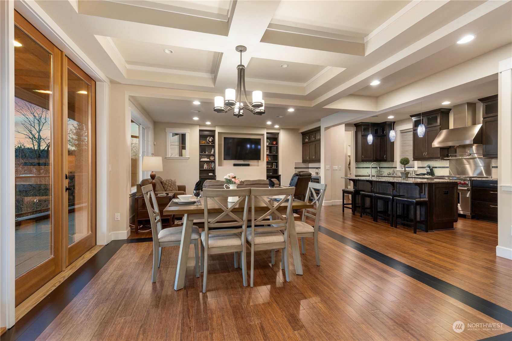 3318 Lake Washington Boulevard North Renton, WA 98056 - Photo 7 of 40 a view of a dining room with furniture and wooden floor