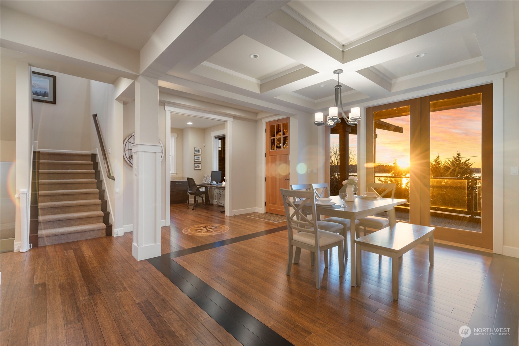 3318 Lake Washington Boulevard North Renton, WA 98056 - Photo 8 of 40 a dining room with wooden floor furniture and a chandelier