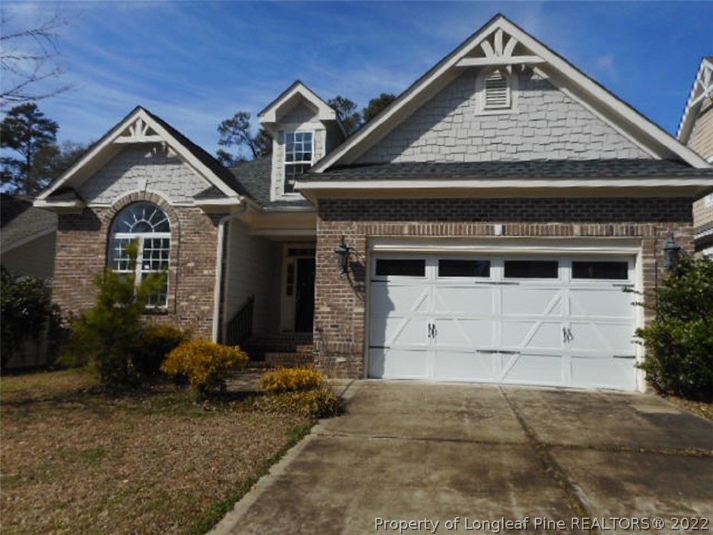 206 Blueridge Road Fayetteville, NC 28303 - Photo 1 of 16 a front view of a house with a yard