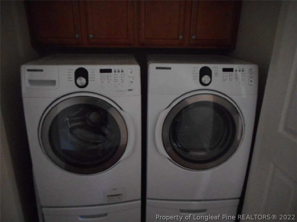 206 Blueridge Road Fayetteville, NC 28303 - Photo 13 of 16 a utility room with dryer and washer