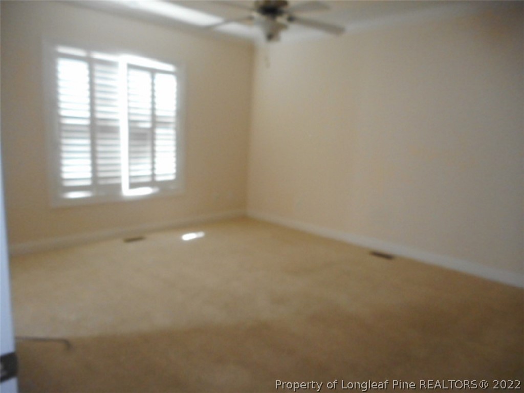 206 Blueridge Road Fayetteville, NC 28303 - Photo 5 of 16 a view of an empty room with a window