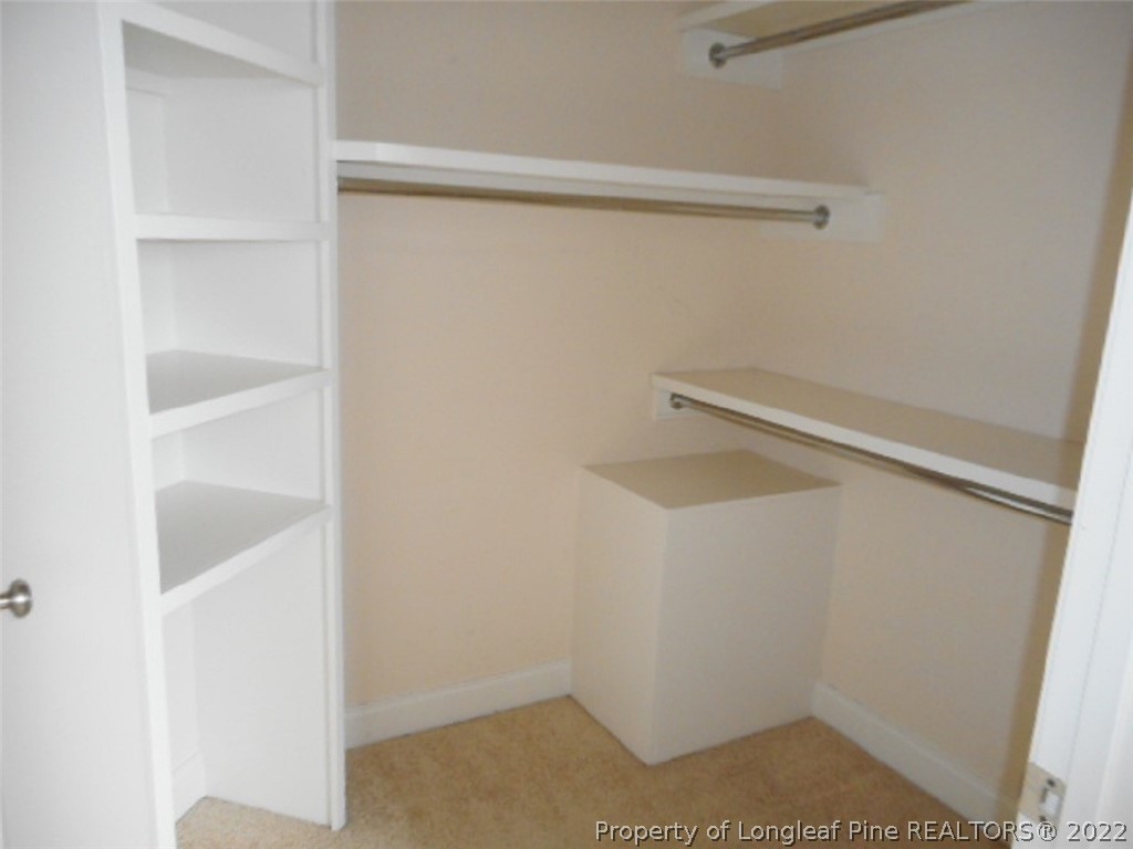 206 Blueridge Road Fayetteville, NC 28303 - Photo 8 of 16 a view of small space with racks on the wall