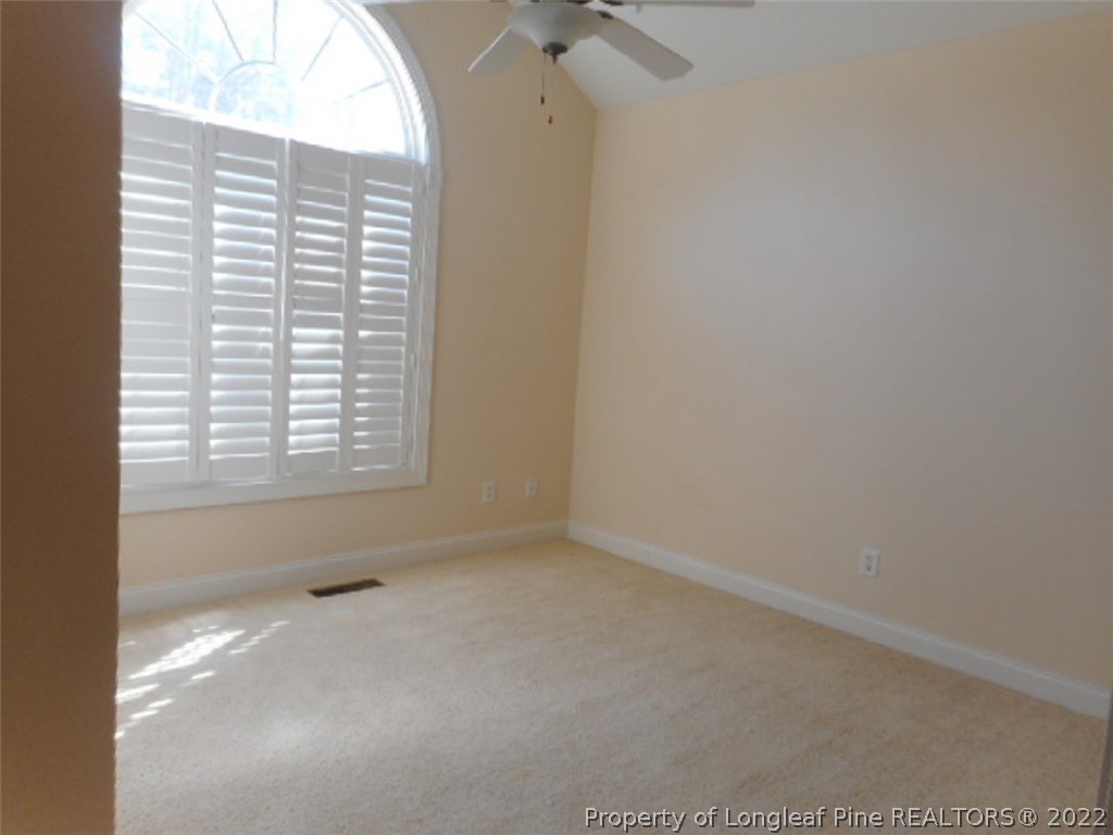 206 Blueridge Road Fayetteville, NC 28303 - Photo 9 of 16 an empty room with a window