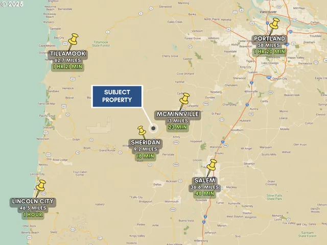 a view of a lush green hillside and houses