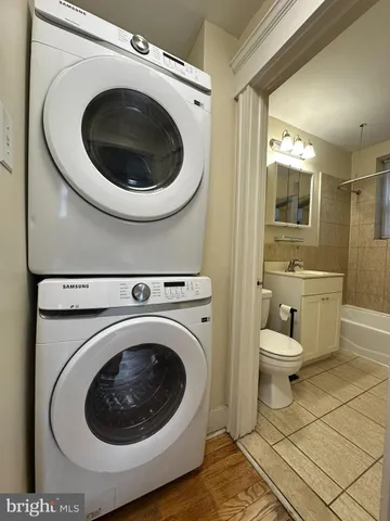 a bathroom with a toilet and a sink