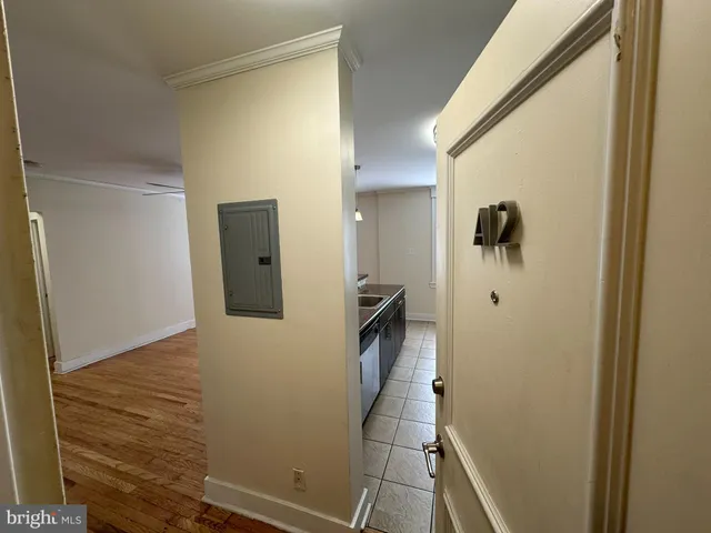 a bathroom with a shower and a sink
