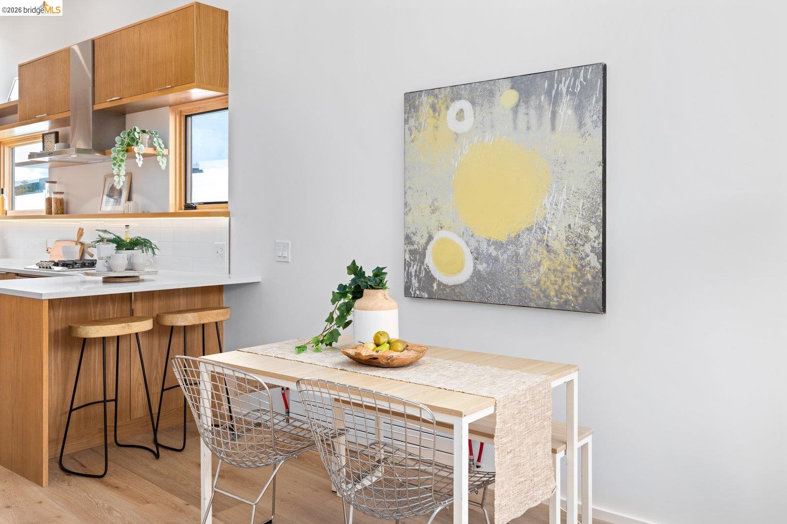817 Jones Berkeley, CA 94710 - Photo 26 of 41 a dining room with a table and chairs
