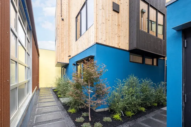 a view of a house with a street