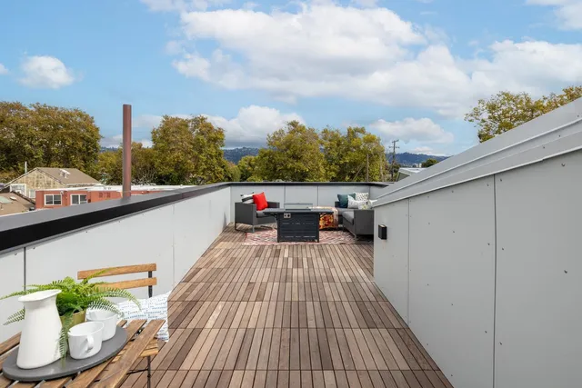 a view of city from terrace with seating space