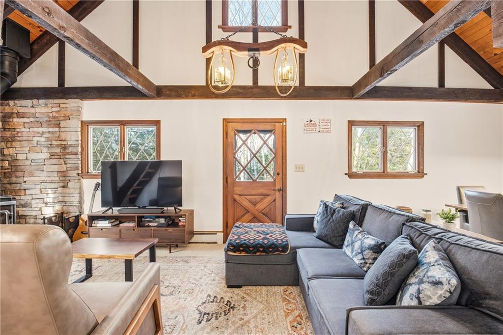 427 Wenatchee Path Central City, PA 15926 - Photo 12 of 42 a living room with furniture and a flat screen tv