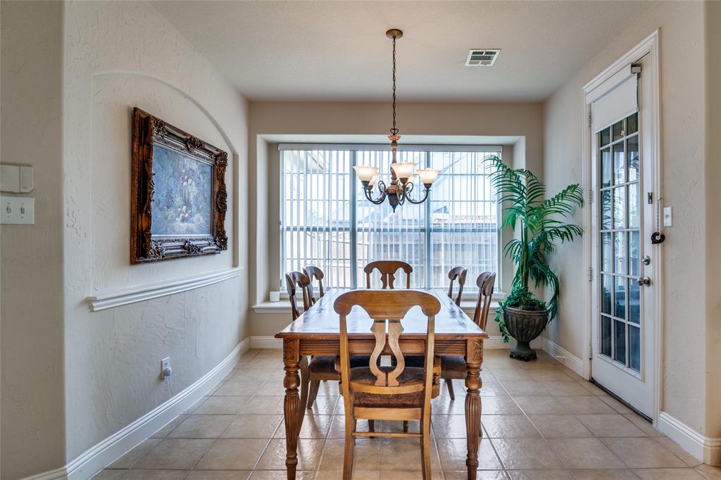 1113 Waterford Way Allen, TX 75013 - Photo 14 of 36 a view of a dining room with furniture window and outside view