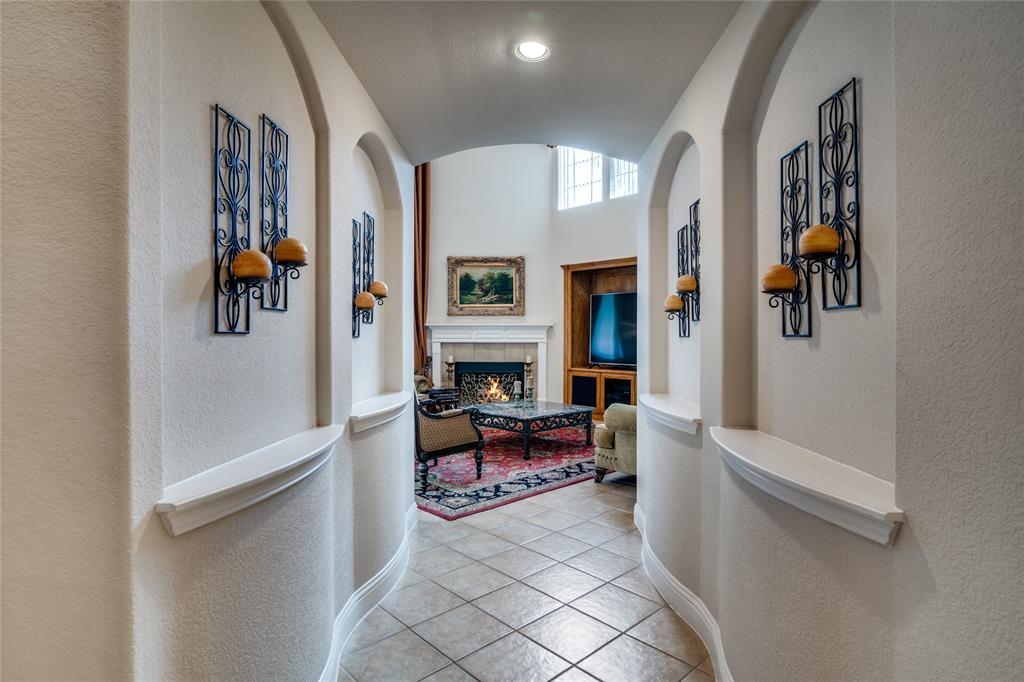 1113 Waterford Way Allen, TX 75013 - Photo 16 of 36 a living room with furniture and a fireplace