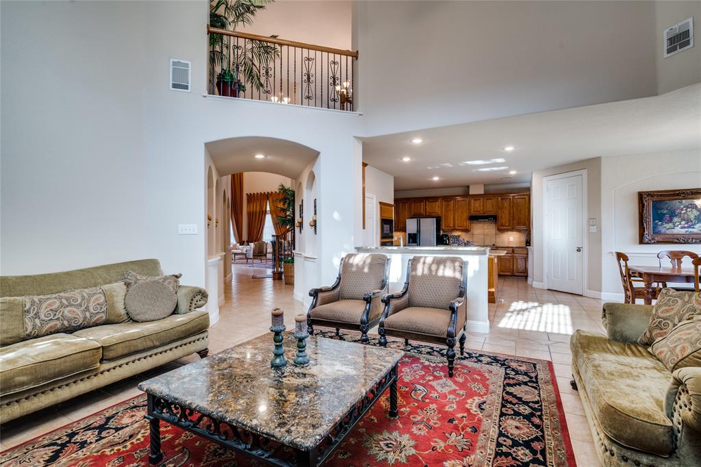 1113 Waterford Way Allen, TX 75013 - Photo 5 of 36 a living room with furniture and a rug