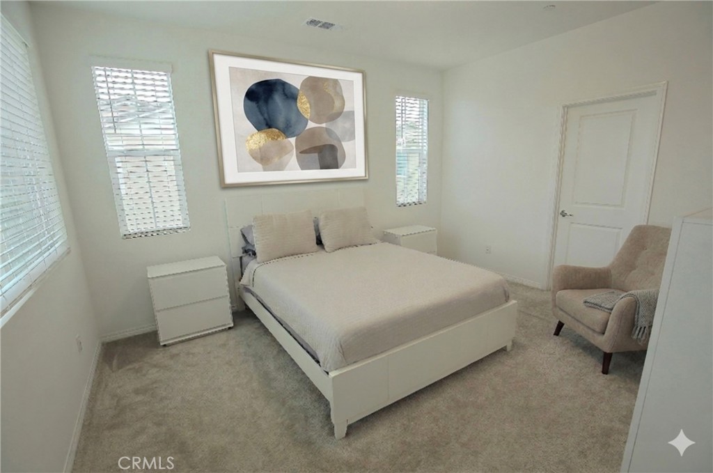 8529 Exposition Street Chino, CA 91708 - Photo 13 of 42 a bedroom with a bed and a couch