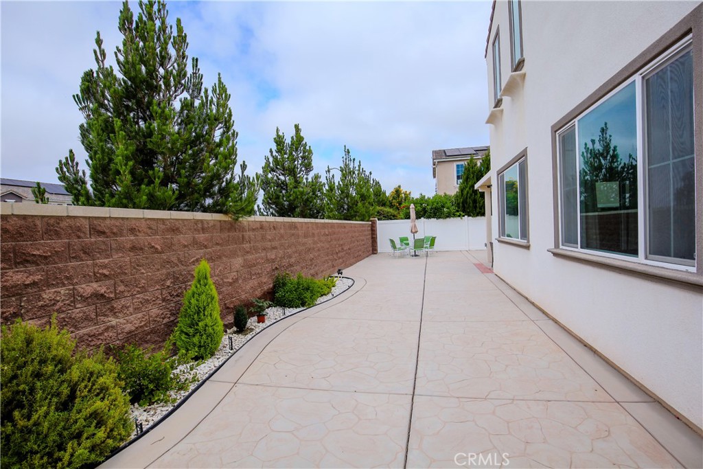 8529 Exposition Street Chino, CA 91708 - Photo 30 of 42 a view of a building with garden
