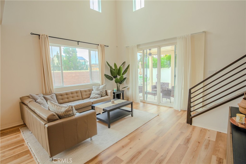 8529 Exposition Street Chino, CA 91708 - Photo 5 of 42 a living room with furniture and a large window