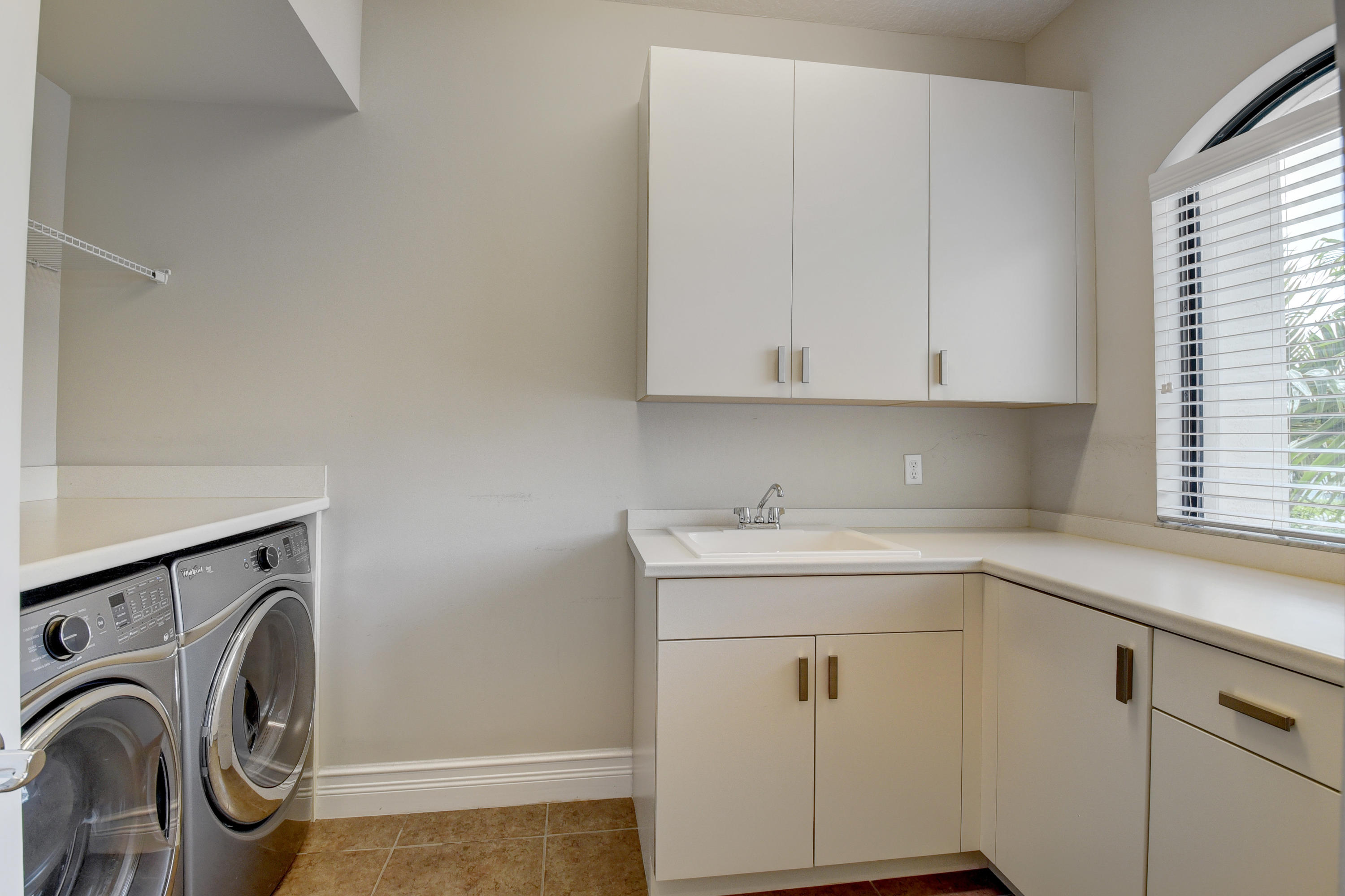 9481 Eden Roc Court Delray Beach, FL 33446 - Photo 28 of 52 Upstairs Laundry