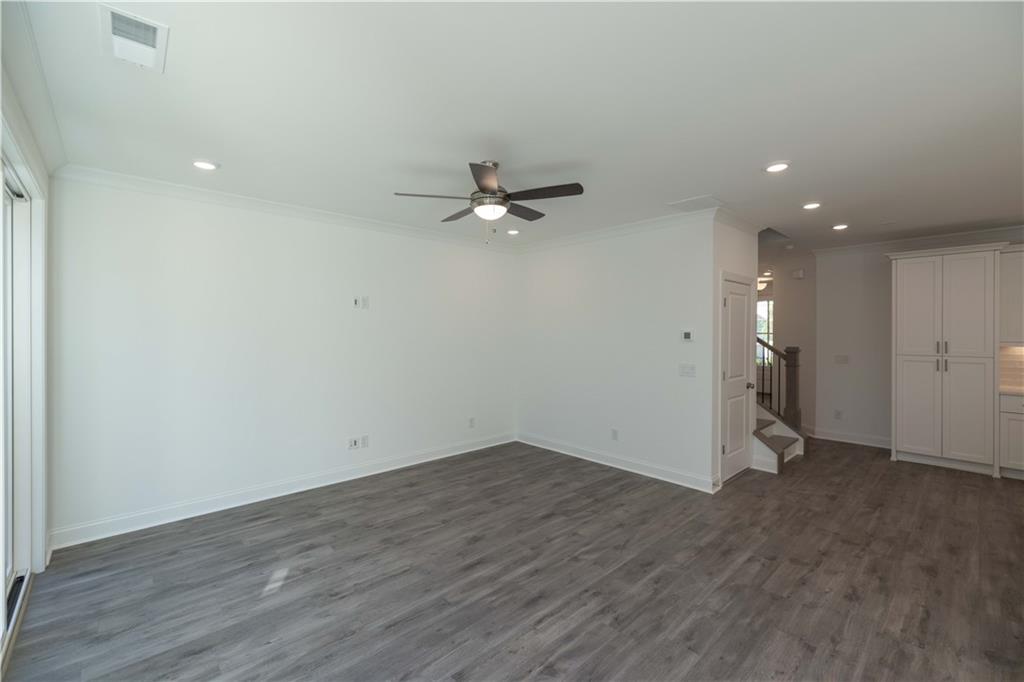 2240 Siskin Sq Road, Unit 88 Duluth, GA 30096 - Photo 20 of 42 wooden floor in an empty room with a window