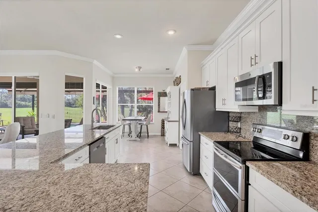 a view of a chairs and table in a patio
