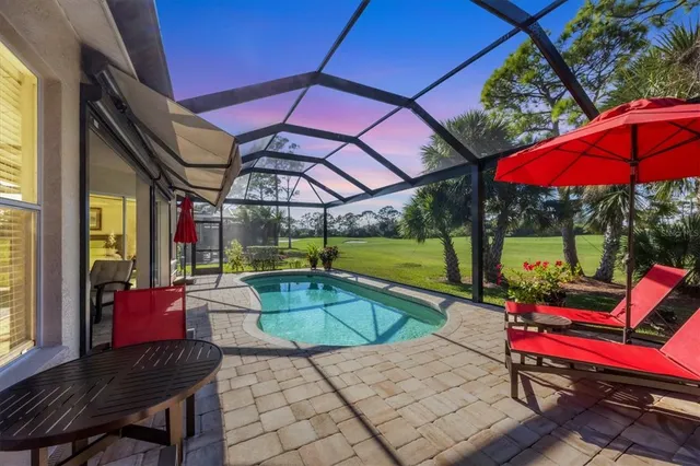 an aerial view of a house with a garden