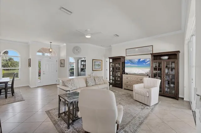 a living room with furniture and a window