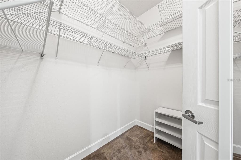 8437 Nandina Drive Sarasota, FL 34240 - Photo 17 of 26 a view of small space with racks on the wall