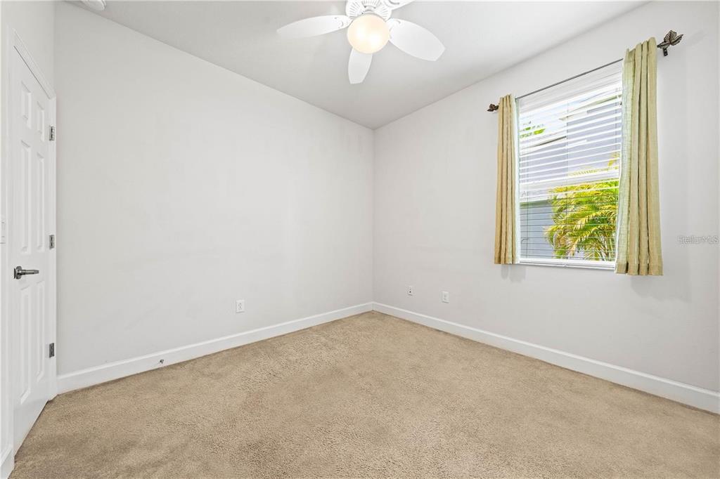 8437 Nandina Drive Sarasota, FL 34240 - Photo 21 of 26 an empty room with a window